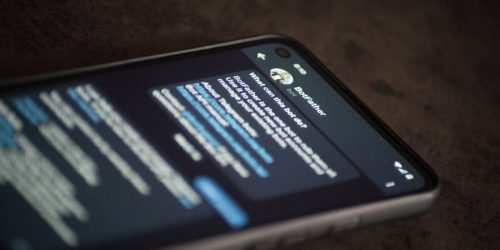 a close up of a cell phone on a table